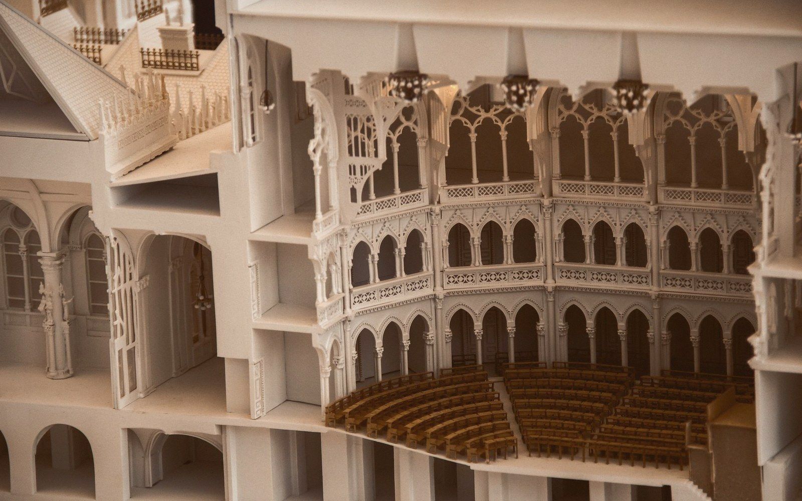 Detailed architectural scale model of a theater interior with tiered balconies and seating